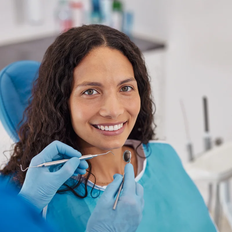 Patient undergoing dental restoration examination with dentist at Fairmont Dental Centre in London Ontario